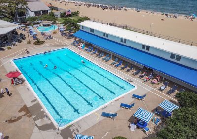 An aerial view of a swimming pool and beach.