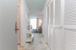 A bathroom with two sinks and a mirror.