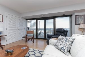 A living room with a couch and chair in it