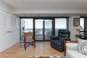 A living room with a chair and a couch